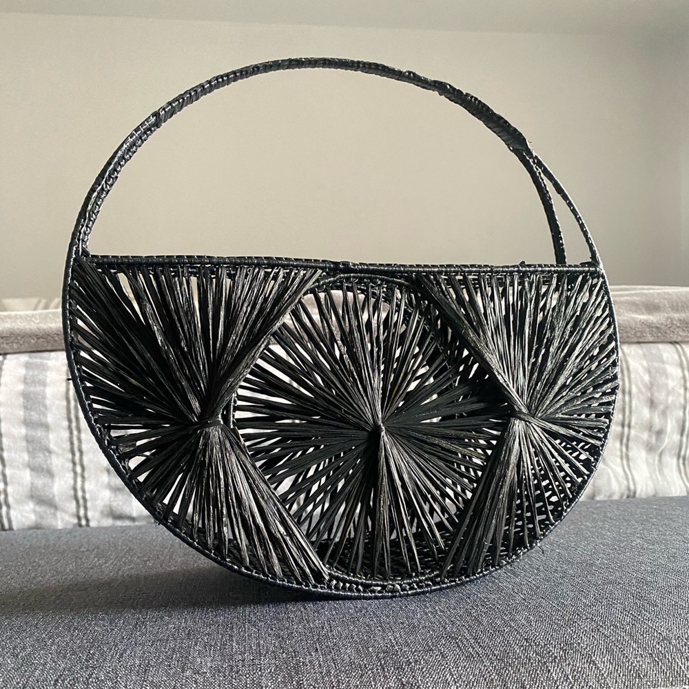 Unique woven black clutch bag